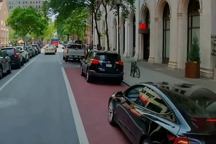 Vehicles are captured on an AI camera blocking a bus lane on Chestnut Street. SEPTA is testing the system, which is used in New York.
