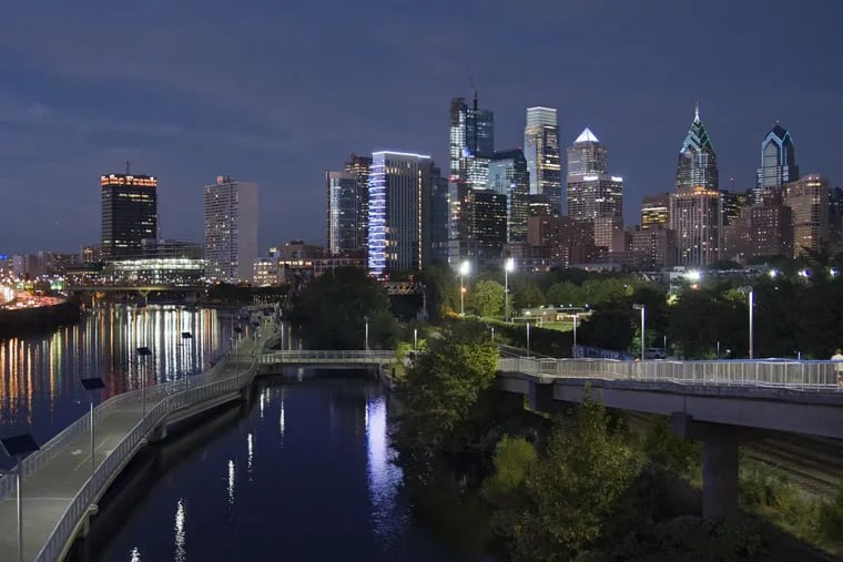 The Philadelphia skyline, seen from the South Street Bridge over the Schuylkill, includes the still-under-construction Comcast Technology Center, a likely engine of future regional growth.