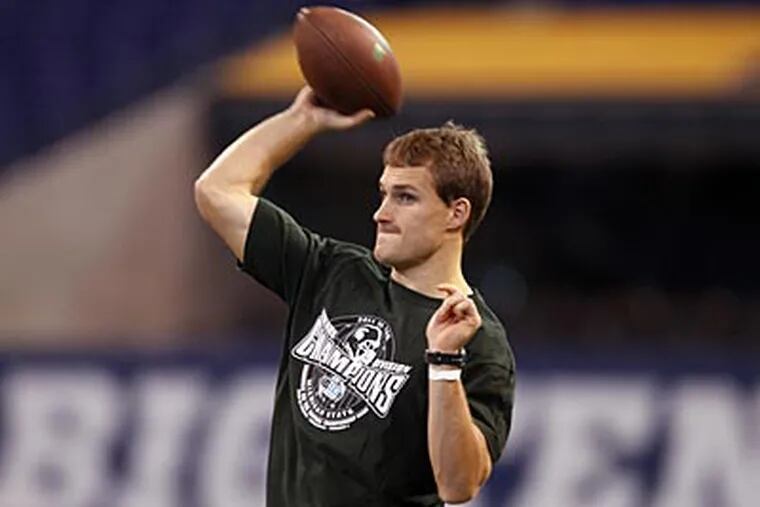 Michigan State quarterback Kirk Cousins may be on the Eagles' radar in the second round. (Michael Conroy/AP)