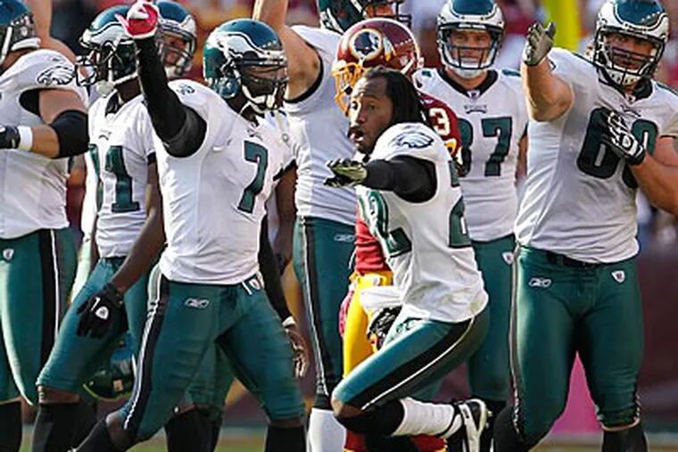 The Eagles celebrate a fourth-quarter first down that sealed a victory over the Redskins. (Ron Cortes/Staff Photographer)