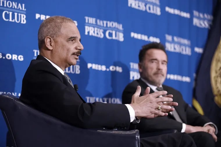 Former Attorney General Eric Holder and former California Gov. Arnold Schwarzenegger discuss redistricting reform at the National Press Club on March 26, 2019, in Washington, D.C.