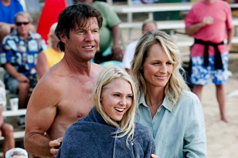 Dennis Quaid, AnnaSophia Robb, center, and Helen Hunt in a scene from "Soul Surfer." (AP Photo/TriStar Pictures, Mario Perez)