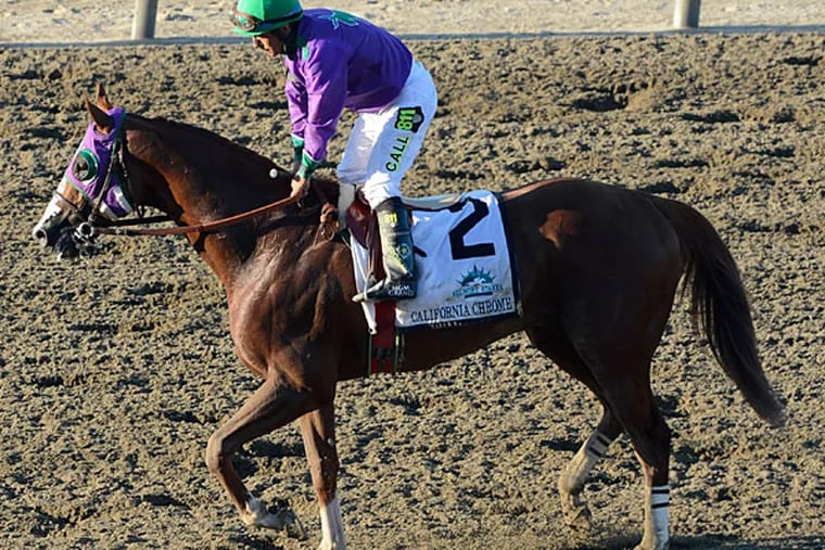 California Chrome with Victor Espinoza up, heads off the track after finishing fourth in the Belmont Stakes horse race, Sunday, June 8, 2014, in Elmont, N.Y. (Gail Kamenish/AP)