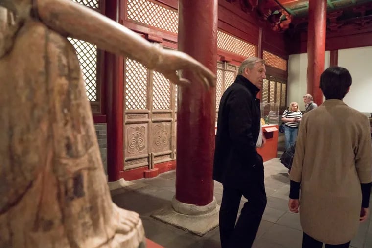 Philadelphia Museum of Art Director Timothy Rub (center) and Curator Hiromi Kinoshita (at right) in the Chinese galleries.
