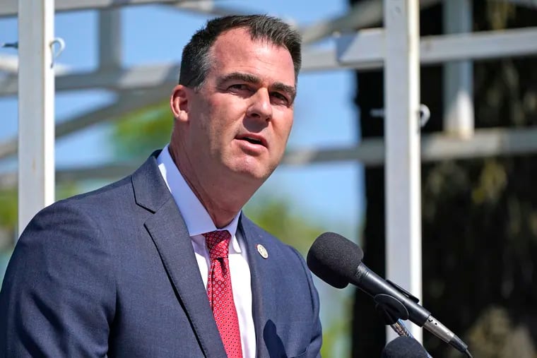 Oklahoma Gov. Kevin Stitt speaks during an Oklahoma Law Enforcement Memorial Ceremony in Oklahoma City. Oklahoma is making voting slightly easier, a contrast to other Republican-led states. Republican Gov. Stitt recently signed a bill that adds a day of early voting and makes changes to ensure mail-in ballots are received in time to be counted.