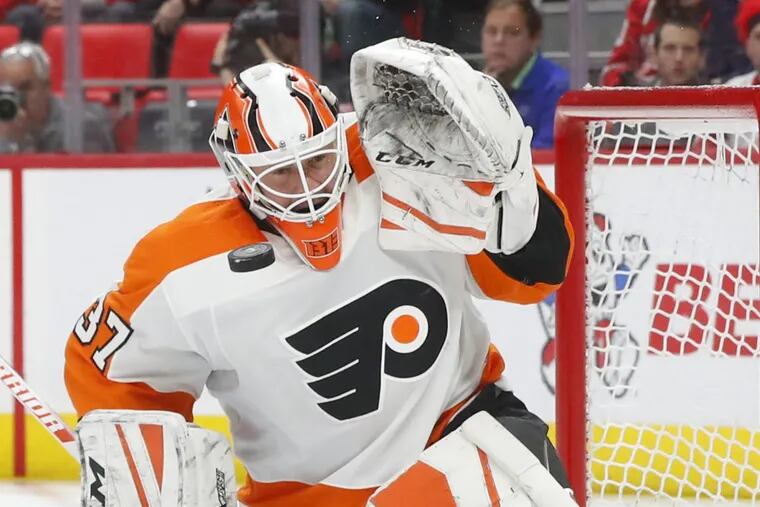 Philadelphia Flyers goaltender Brian Elliott stops a shot against the Detroit Red Wings last week.