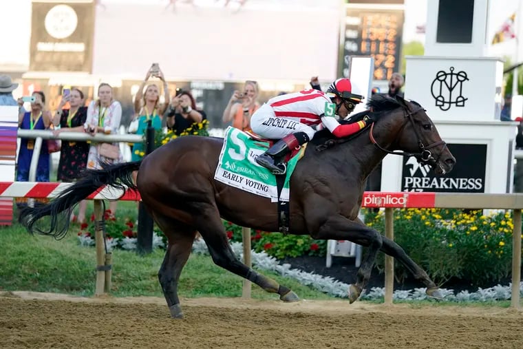 Jose Ortiz atop Early Voting wins the 147th running of the Preakness Stakes horse race at Pimlico Race Course.