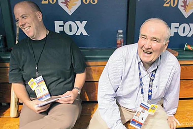 Phillies president David Montgomery (right) sits with Comcast SportsNet announcer Tom McCarthy. (Staff File Photo)