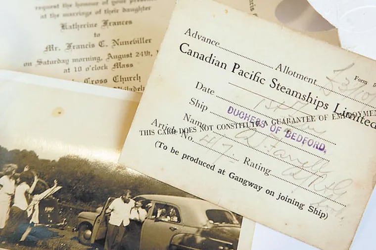 Possessions from Albert Farrell that were inside a sealed envelope, A black and white photo from 1953, a tattered wedding invitation to a 1946 ceremony in Philadelphia, and Canadian Pacific Steamships Ltd. pay certificate. ( Michael S. Wirtz / Staff Photographer )
