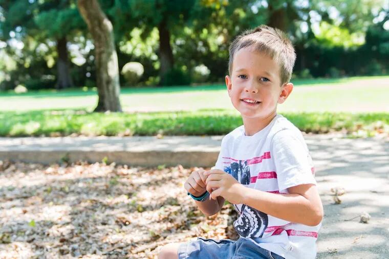 Landon Morris, 6, sits at the park near his house in Yuba City, Calif., on July 24, 2017. Jessica Morris says her son leads a normal life, despite his hemophilia diagnosis.