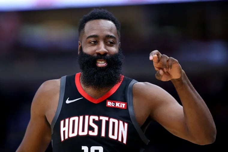 The Houston Rockets' James Harden has a laugh during a game against the Chicago Bulls.