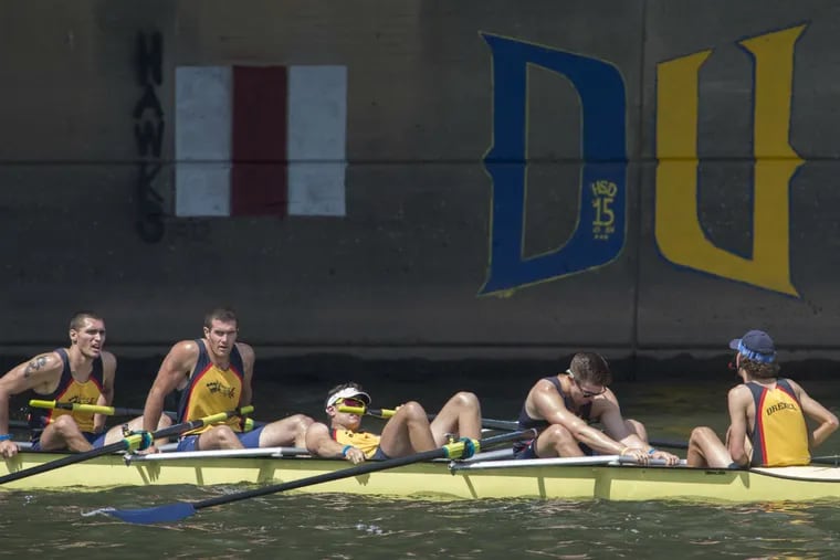 Oarsmen from Drexel University (from left) Ivo Krakic, Daniel Dollin, Justin Best, stroke Mikulas Sum and coxswain Christopher Henderson, are spent after finishing 2nd in the finals of the men's varsity heavyweight eight race at the Dad Vail Regatta May 14, 2016. Florida Institute of Technology won the race.