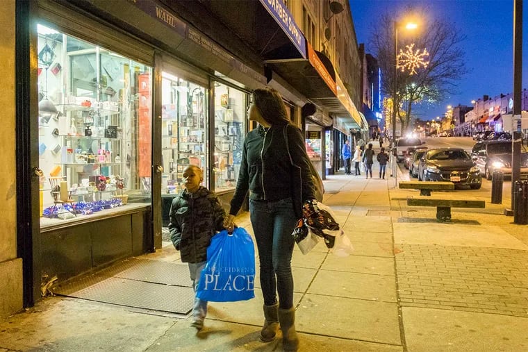 Shopping along 69th Street in Upper Darby, one of many communities regionwide where income has dropped since 2009, according to U.S. Census data.