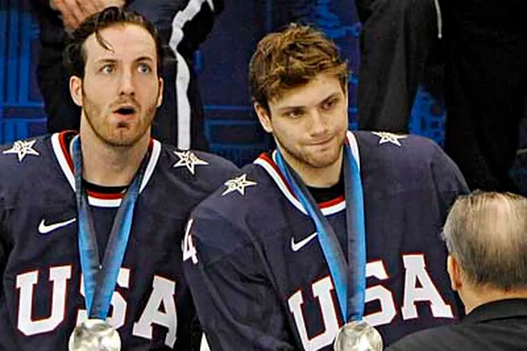 U.S. forward and Cherry Hill native Bobby Ryan (center) accepts his silver medal. (Clem Murray/Staff Photographer)