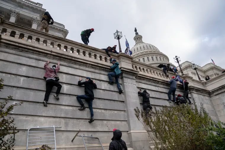 Members of a pro-Trump mob scaled the walls on the Senate side of the Capitol and gained access inside the building during an insurrection Wednesday.