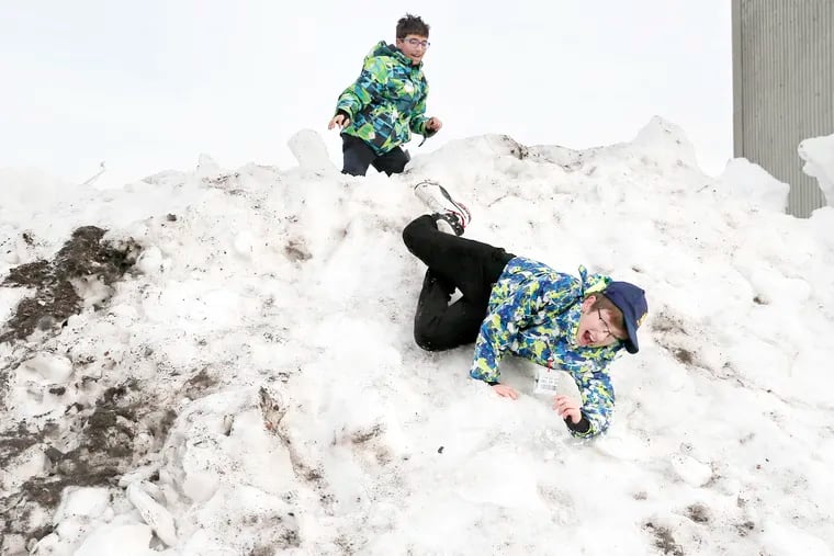 It was a faux white Christmas at Penns Landing on Dec. 25, 2019 when two boys played on snowy mountain. But the "snow" actually was from the ice at the Blue Cross River Rink in Philly. Historically, Christmas snow is a long shot.