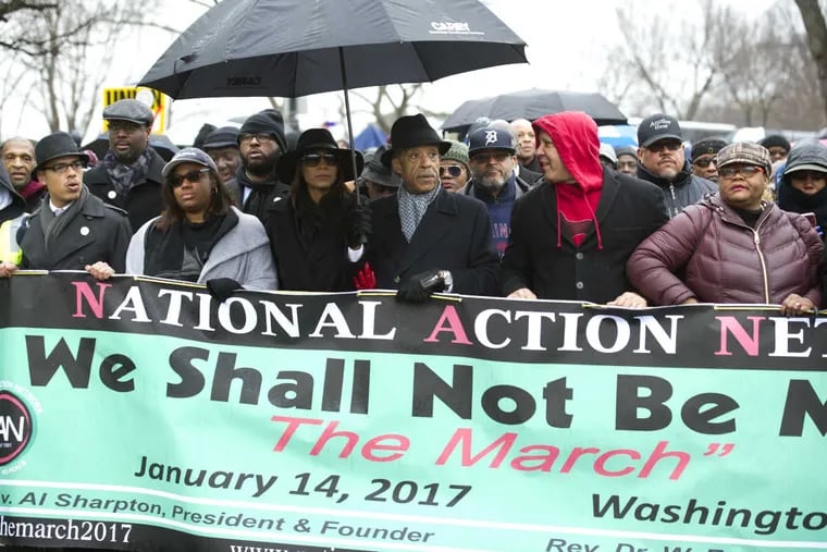 Rev. Al Sharpton, center, and civil rights advocates march to honor the Rev. Martin Luther King, Jr. in Washington, Saturday, Jan. 14, 2017. The National Action Network, the group founded by the Rev. Al Sharpton, sponsored Saturday&#039;s &quot;We Shall Not Be Moved&quot; march and rally ahead of Monday&#039;s Martin Luther King Jr. Day holiday.
