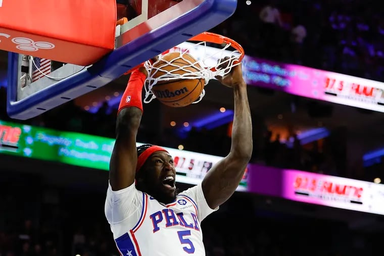 Sixers center Montrezl Harrell dunks the basketball against the Denver Nuggets during the first quarter on Saturday, January 28, 2023 in Philadelphia.