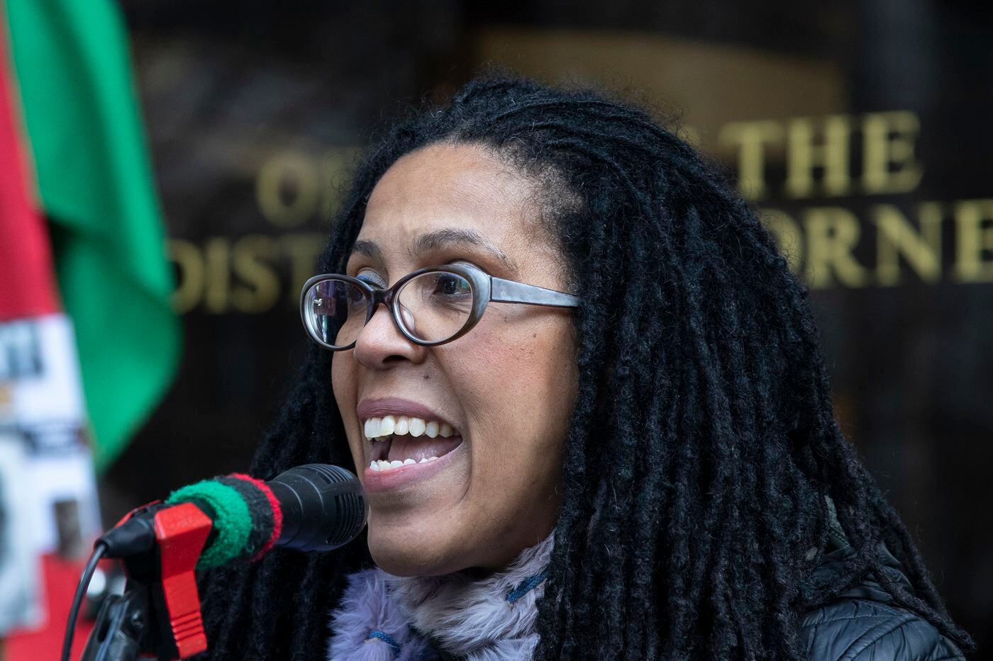 Johanna Fernandez, a supporter of Mumia Abu-Jamal, spoke outside the Philadelphia District Attorney's Office during the rally on Friday, Feb. 28, 2020.