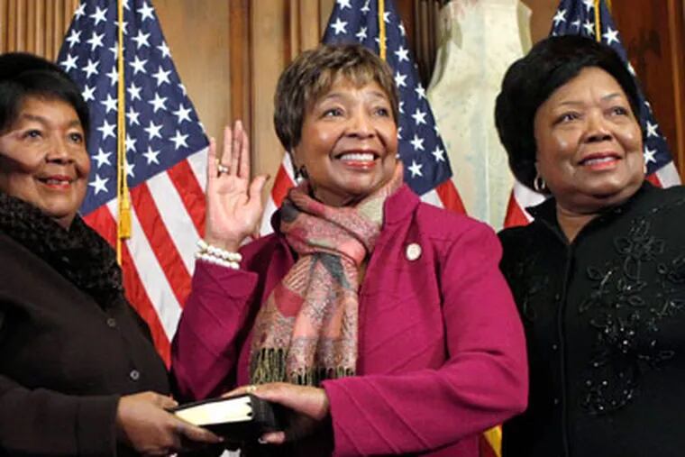 FILE - In this Jan. 5, 2011 file photo, House Speaker John Boehner of Ohio participates in a ceremonial swearing in with Rep. Eddie Bernice Johnson, D-Texas, second from right, on Capitol Hill in Washington. For two decades, Eddie Bernice Johnson has been an outspoken voice for Democrats in a bright blazer and multicolored scarf. But for the first time, the first black woman to represent North Texas in Congress is facing serious opposition in this month's primary. And the effort to unseat her is just one of several challenges being mounted against some of the longest-serving blacks in Congress.  (AP Photo/Jacquelyn Martin, File)