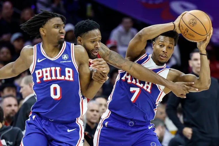 Tyrese Maxey (left) and Kyle Lowry (right) kept the Sixers afloat offensively in their over the Heat on Monday.