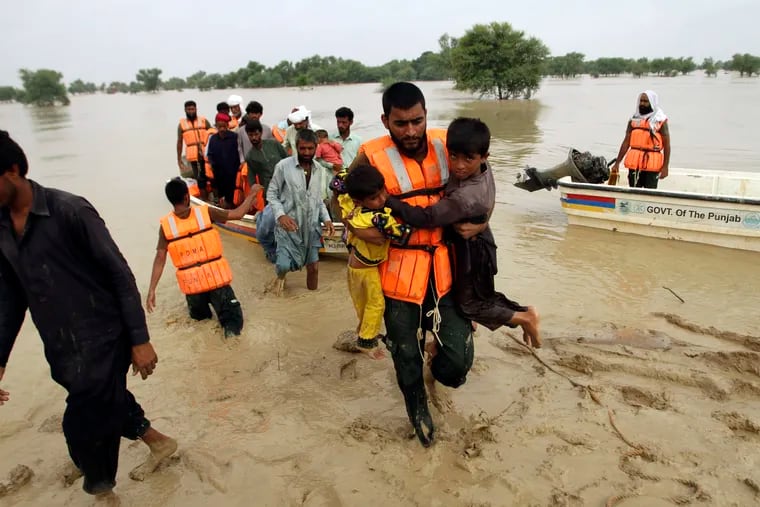 Army troops evacuating people from a flood-hit area in Rajanpur, district of Punjab, Pakistan, on Saturday.