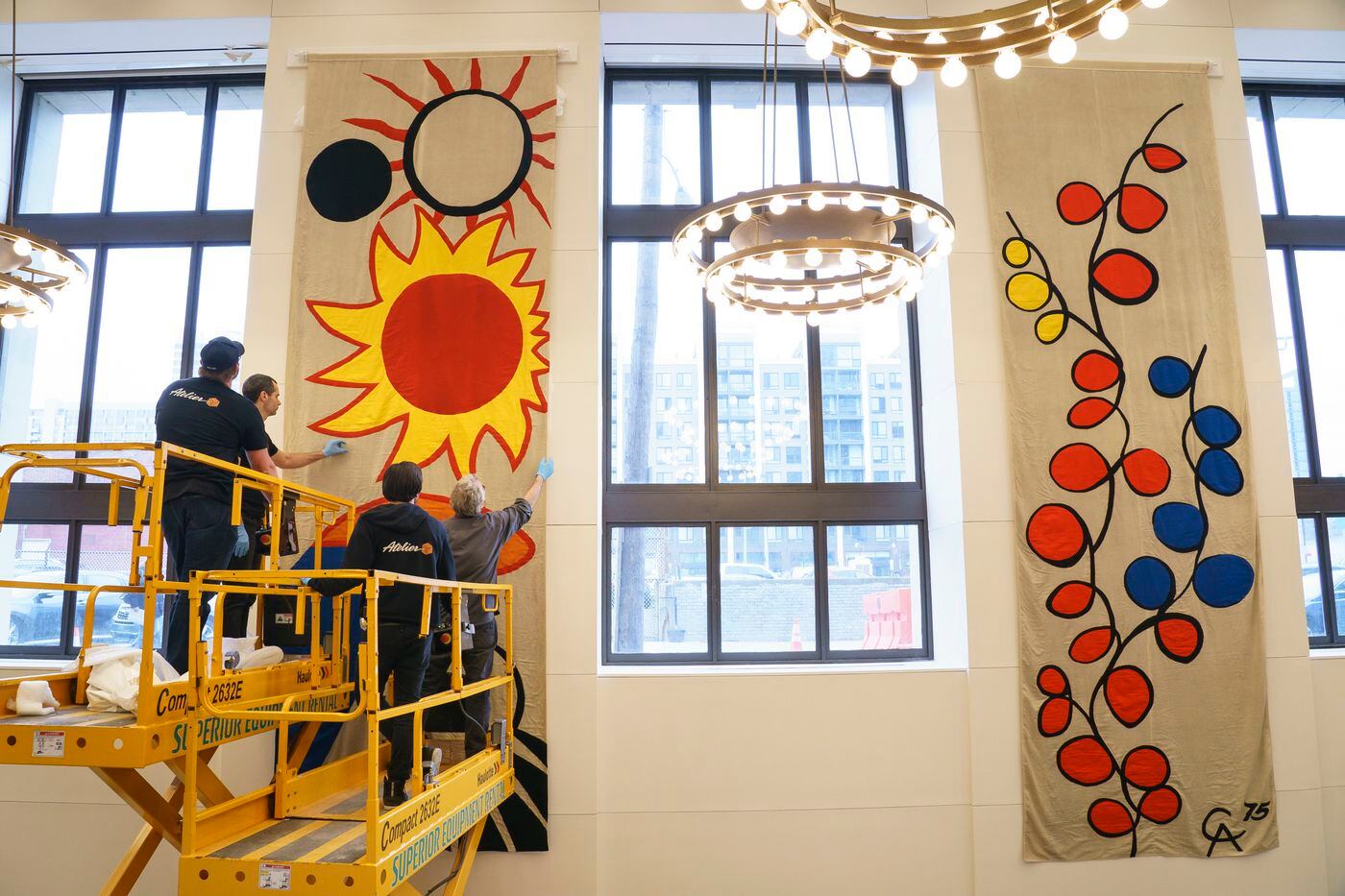 Banners created by Alexander Calder in the 1970s, lost and out of view for most of the last 35 years, are installed at the Free Library of Philadelphia last month.