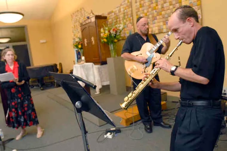 During a service in Warrington , cantor Joan Sacks provides vocals for guitarist David Madden and sax player Walt Beier. A keyboardist and drummer also are part of the ensemble. Rabbi Jon Cutler said he was hoping to keep members of his prayer group engaged.