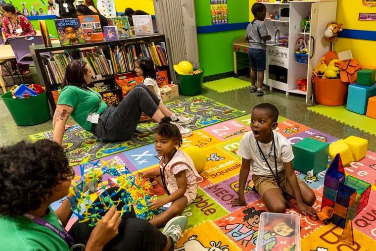 Ryan Reed Jr., 5, of West Philadelphia, (right), is playing with toys along with fellow kids attending the Kindergarten Readiness Program at the Please Touch Museum in Philadelphia, Pa., on Thursday, Aug., 2, 2023.