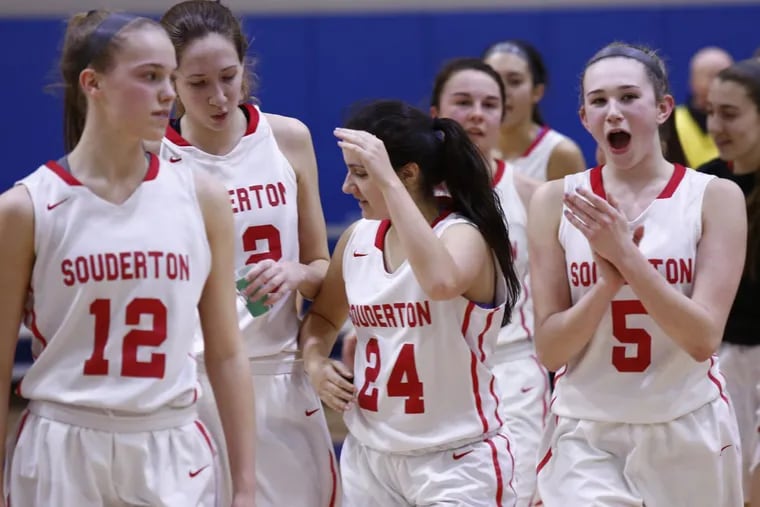Souderton players (front from left) Megan Walbrandt (12), Kate Connolly (32), Sami Falencki (24) and Megan Bealer (5) during the state playoffs last season. On Friday, Kate Connolly scored 20 points to help Souderton beat C.B. South.