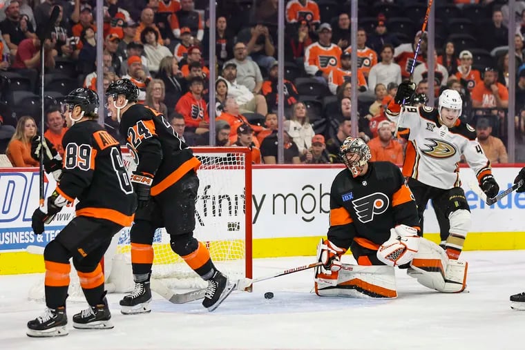 Anaheim Ducks left wing Max Jones celebrates teammate Adam Henrique’s goal against Flyers goaltender Sam Ersson on Saturday.