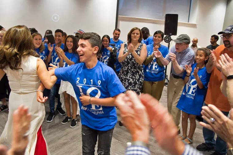 Soldiers with the Israel Defense Forces (IDF) and children and siblings of fallen Israeli soldiers dance with benefactors during a group Bar/Bat Mitzvah celebration at the end of a summer camp for sponsored by the Friends of the IDF Legacy program in Bala Cynwyd July 17, 2019. The 36 children, aged 12 to 14, all have lost a family member who was serving in IsraelÕs military.