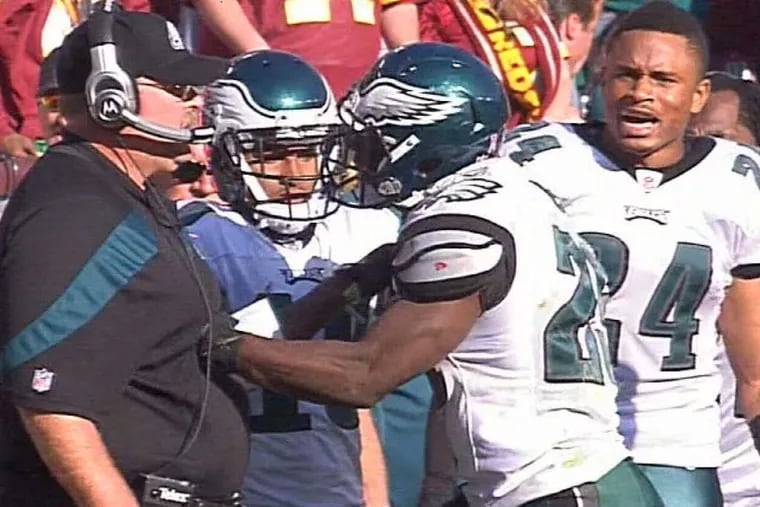 Fox TV cameras catch McCoy giving Andy Reid a celebratory shot to the gut.