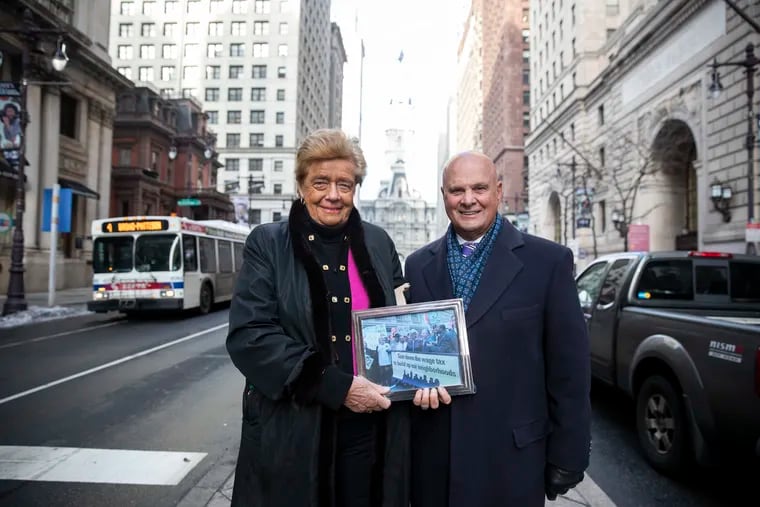 Judith von Seldeneck and Charles Pizzi, former leaders of the Chamber of Commerce for Greater Philadelphia, stand at Broad and Walnut Streets, where in 2002 the pair organized a protest against the wage tax that became known as the "briefcase brigade."