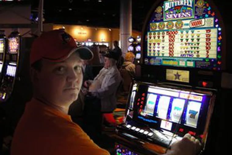 A career path for Jerome Stanton arrived with the slots parlor at Harrah&#0039;s Chester. Hired there as a guard, he advanced to security supervisor; at left, he makes his rounds. Above, Troy Yoder, 42, of Leola, Lancaster County, plays at Hollywood Casino near Harrisburg. Yoder said his property taxes had been reduced by $114 thanks to tax rebates from casino revenues.