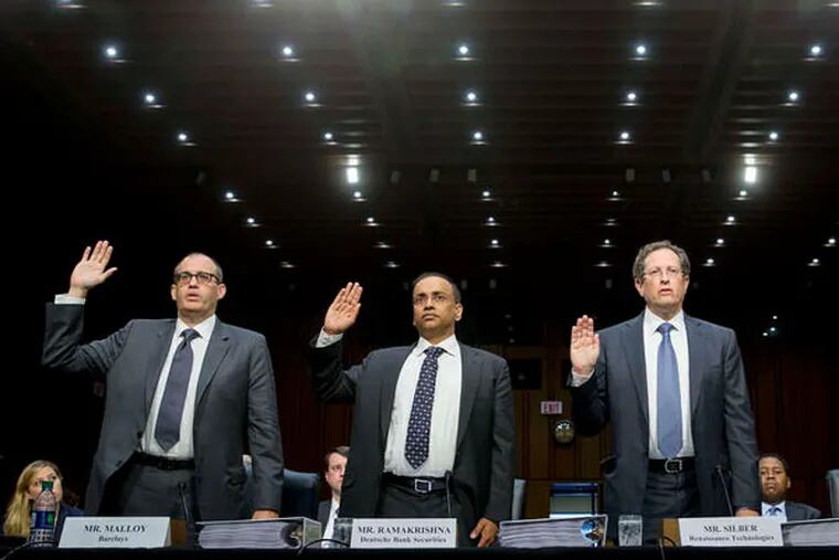 From left, Martin Malloy, managing director at Barclays Capital Inc.; Satish Ramakrishna, global head of prime services risk at Deutsche Bank Securities Inc.; Mark Silber, executive vice president, chief financial officer, and chief legal officer at Renaissance Technologies L.L.C.; and Jonathan Mayers, counsel at Renaissance Technologies L.L.C., are sworn in at a Senate subcommittee hearing in Washington.