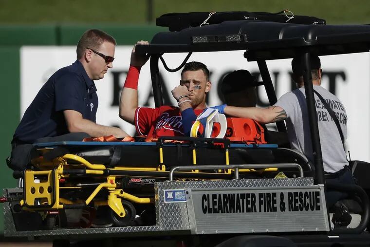 Phillies third baseman Will Middlebrooks leaves the spring training game against Baltimore Orioles after injuring his leg during the eighth-inning at Spectrum Field in Clearwater, FL on Saturday, February 24, 2018.