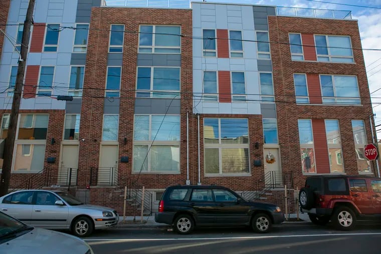 City Council is considering changes to the 10-year tax abatement for residential construction such as these apartments at 20th and Wharton in South Philadelphia.