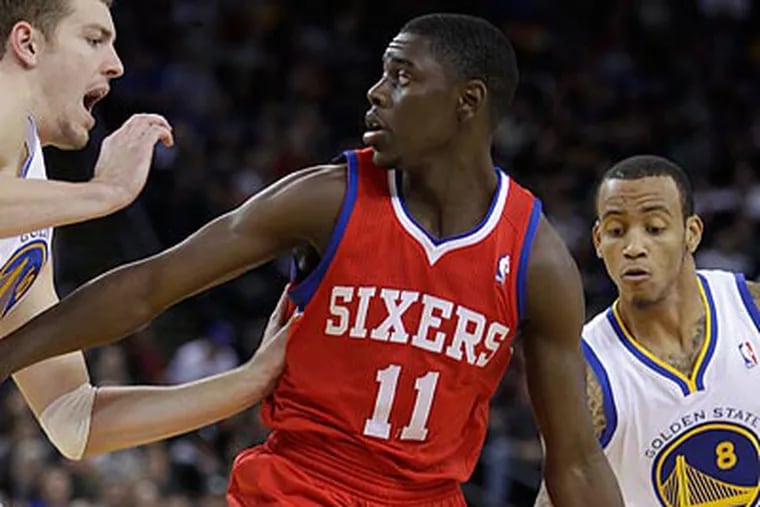 Jrue Holiday's youth has helped him stay fresh during a grueling stretch of games for the 76ers. (Ben Margot/AP)