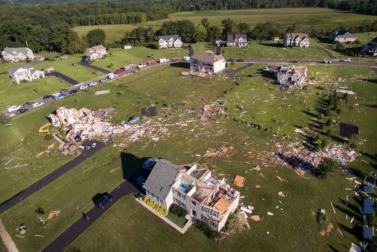 Homes damaged from the remnants of Hurricane Ida in Mullica Hill, N.J., in September 2021.