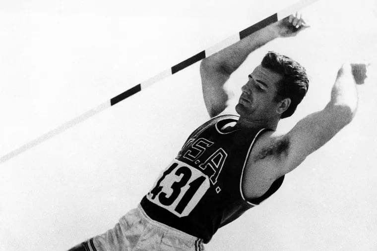 Don Bragg performs a pole vault during the 1960 Olympics in Rome, in which he won a gold medal.