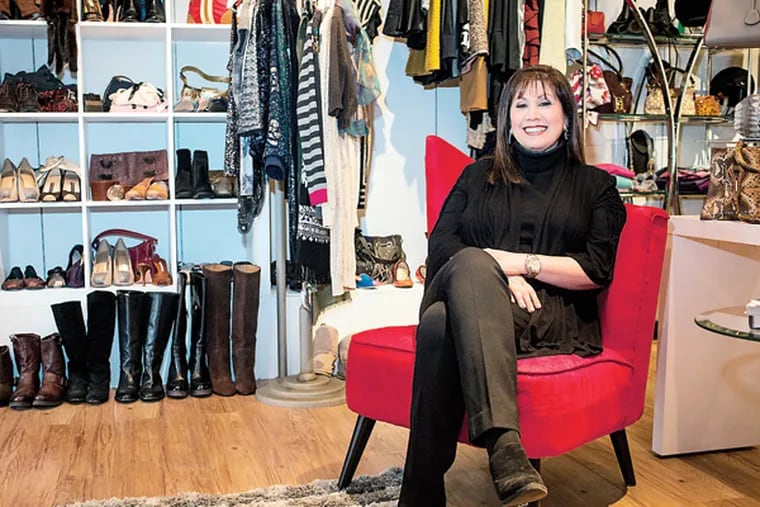 Shelly Lesse runs her own business bringing high-end consignment goods to the world of boutiques with her store called Rachelle. Based in Bryn Mawr, much of the items are gently used or never-touched coveted labels. (Emily Cohen/For the Inquirer)