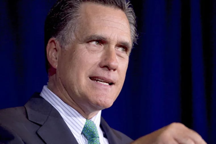 Mitt Romney, still dogged by a years-old tale. (Steven Senne / AP Photo)