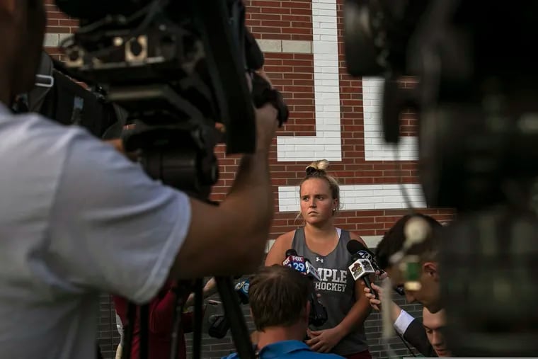 Temple University field hockey player Lucy Reed waits to be interviewed at the conclusion of practice at Howarth Field in Philadelphia, Tuesday, Sept. 10, 2019. The team's game at Kent State on Saturday against Maine was cancelled due to pregame football fireworks. After the shock wore off of halting a women's field hockey game in the middle of overtime just so they could shoot off fireworks for a football game that hadn't even started, the captain of the Maine team said it's par for the course when you're a female athlete. Indeed, for all the advances created by Title IX, there's still an awful lot of hearts and minds that still need changing. (Heather Khalifa/The Philadelphia Inquirer via AP)
