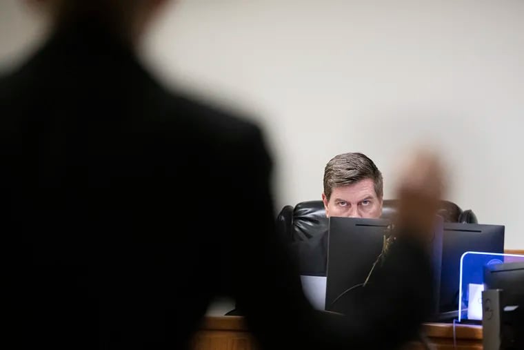 Superior Court Judge John Kennedy listens to arguments on Friday during a hearing for a civil sexual abuse lawsuit against Camden School Advisory Board president Wasim Muhammad.
