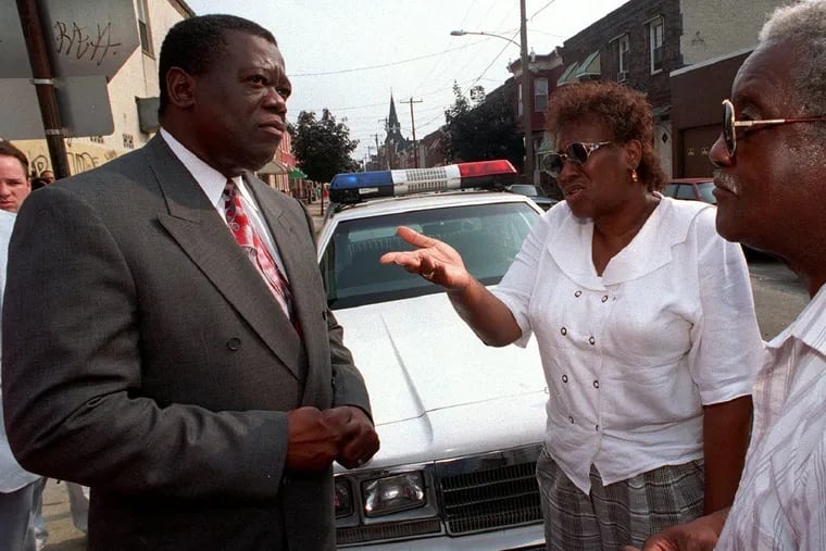 Commissioner Neal, always anxious to hear the concerns of others, listens to residents in 1994.