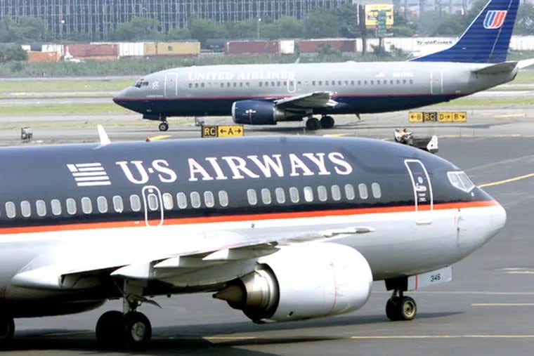 A United Airlines jet and a US Airways jet cross paths in Newark, N.J. In October, U.S. airlines operated 86 percent of their flights on time, the highest rate for the month in five years, as they trimmed service. US Airways, Philadelphia&#0039;s dominant airline, was third in on-time arrivals, making it within 14 minutes of schedule, trailing Northwest and Southwest airlines.