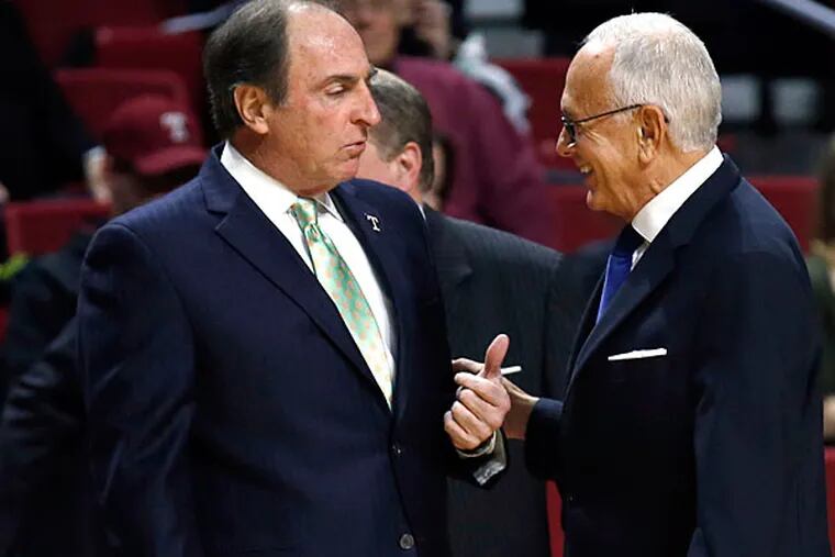 Temple Head Coach Fran Dunphy and SMU Head Coach Larry Brown meet before the two teams played each other. (Yong Kim/Staff Photographer)