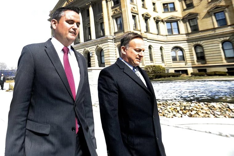 Pa. state Represenative Nick Miccarelli (R. Delaware), left, leaves the Luzerne County Court House, Wilkes-Barre, PA., after a hearing on a Protection from Abuse Order filed by State Representative Tarah Toohill (Luzerne,R) Thursday March 15,2018 FRED ADAMS / For the Inquirer