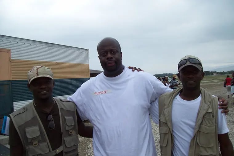 Chad Dion Lassiter (center), executive director of the Pennsylvania Human Relations Commission, visited Haiti in 2010 to provide trauma counseling in the aftermath of a devastating earthquake.